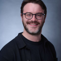 Adam Collins headshot